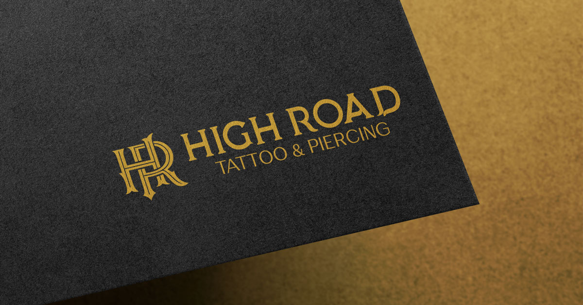 High Road Tattoo & Piercing Logo on Black Letterhead